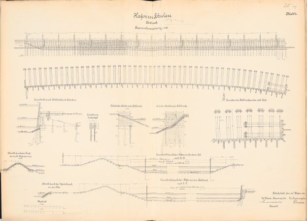 Offenes Buch mit detaillierten Zeichnungen und Text, enth"{a}lt eine Illustration der Eisenbahnschienen.