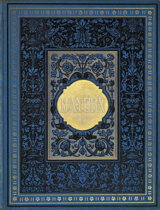 Ein blau-goldenes Buch mit dem Wort 'Bayern' auf dem Cover, das mit kunstvollen Verzierungen versehen ist.
