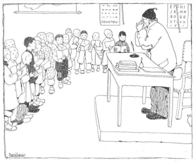 Ein Mann sitzt an einem Schreibtisch mit Büchern und Gegenständen vor einer Gruppe von Kindern, mit Papieren an der Wand hinter ihm, trägt Schuhe als Lehrer.