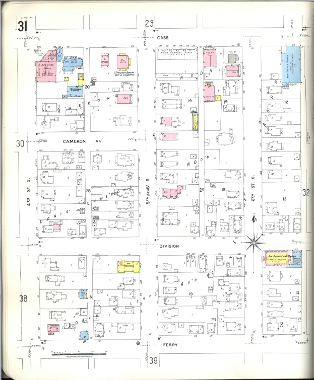 Altes Buch mit einer Stadtkarte aus den 1920er Jahren auf dem Cover, die Straßen, Gebäude, Parks und Sehenswürdigkeiten zeigt.