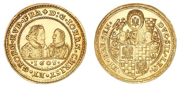 Goldmünze mit einem Wappen, Text und Bildern auf einem weißen Hintergrund.